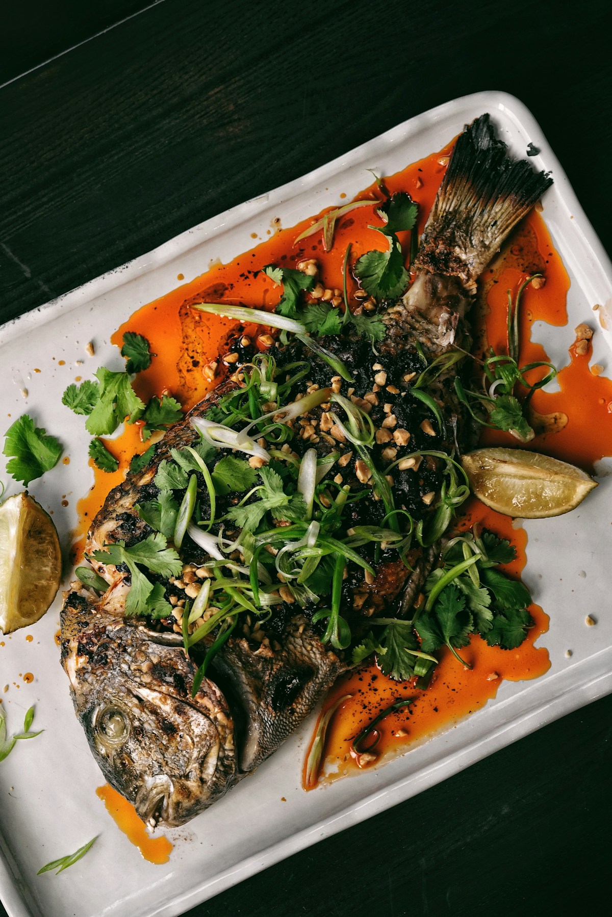 Grilled sea bream with tahini and flatbread at an Alexandria waterfront restaurant